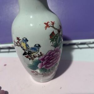 A small Chinese porcelain vase with famille rose and bird decorations- preloved